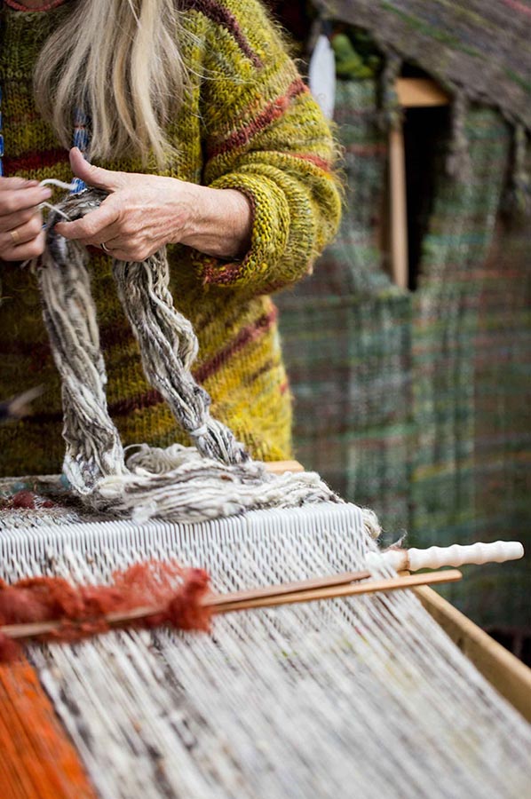 Jane weaving on a Brinkley Loom